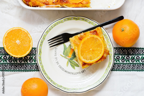 Photos Traditional Greek filo pastry pie with oranges, Portokalopita