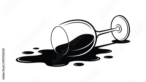Spilled wine glass with black liquid puddle