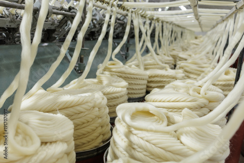 Obraz na płótnie Merino wool yarn coils on industrial textile production line
