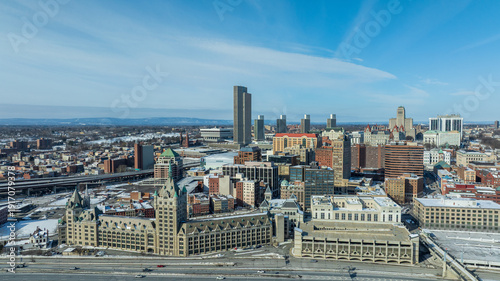 Konstfotografi Aerial view of downtown Albany, New York in winter, featuring skyline, historic architecture, and snow-covered streets under clear sky