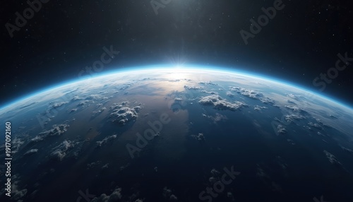 View of Earth from space with bright sun rising over curved horizon. Clouds drift across oceans and landmasses. Stars dot the deep black sky.