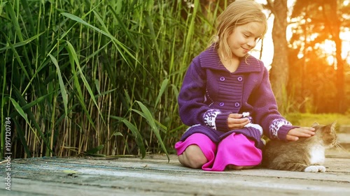 Wallpaper Mural Little girl stroking cat Torontodigital.ca