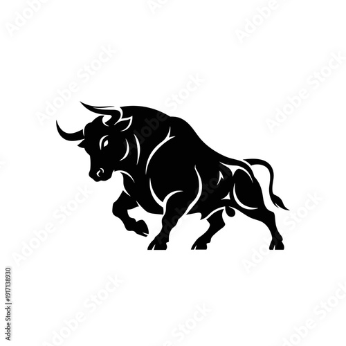Powerful black bull silhouette in an aggressive stance