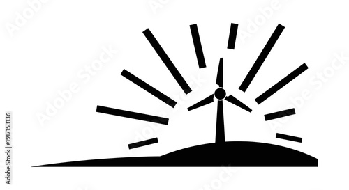 Wind turbine on hill at sunrise or sunset.