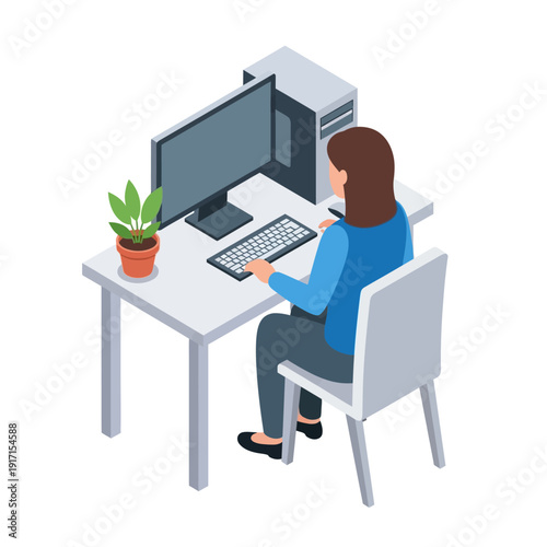 A woman sits at a desk working on a computer with a plant nearby.
