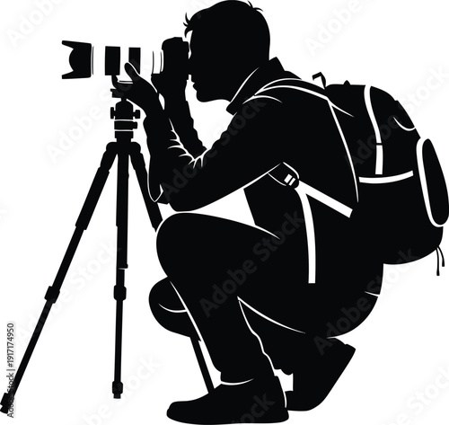 a silhouette of a photographer crouching with a camera on a tripod wearing a backpack capturing a moment in black and white