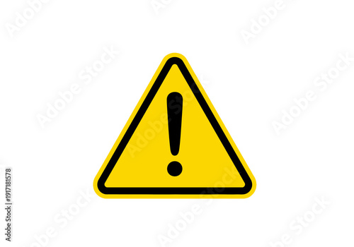 Warning sign with exclamation mark on yellow background viewed from straight on