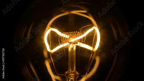 Glowing Light Bulb with Illuminated Filament.