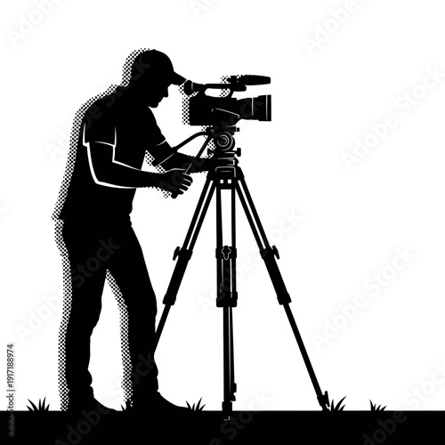 Cameraman silhouette with professional video camera on tripod, outdoor filming