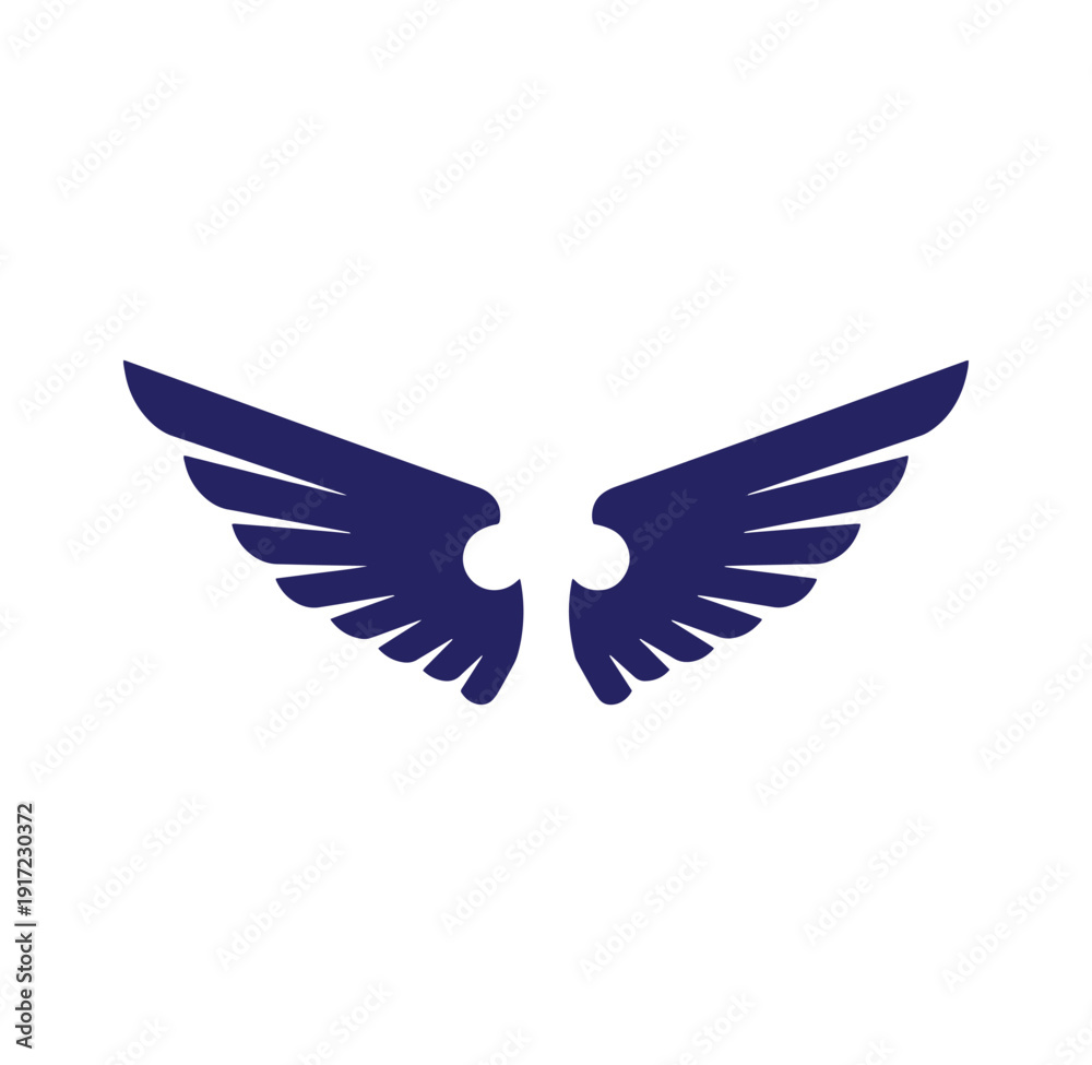 Fototapeta premium Dark blue bird wings spread wide in flight symbol of freedom and movement
