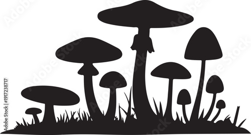 Black silhouette of mushrooms growing in grass white