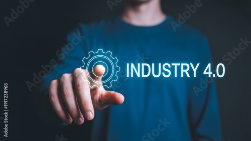 Business professional holding Industry 4.0 gear icon with digital technology hologram concept