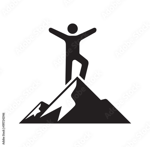 man standing on top of mountain with arms outstretched in celebration