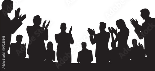 Silhouettes of people clapping and cheering crowd