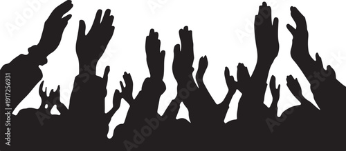 Silhouettes of people raising hands in a crowd