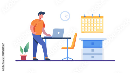 Man working at standing desk with laptop and calendar.
