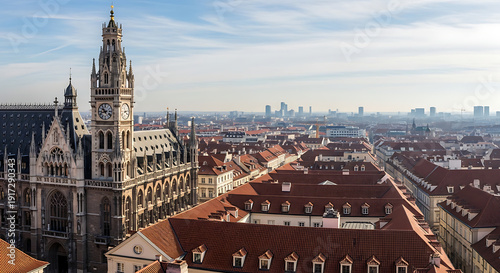 Aerial View of Historic Cityscape with Gothic Architecture and Red Roofs on a Cloudy Day