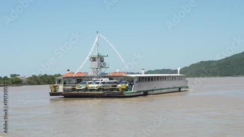 Ferry crosses the Itajaí river, Brazil