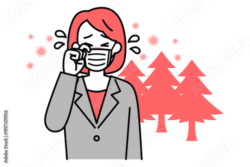 花粉症がつらいスーツの女性