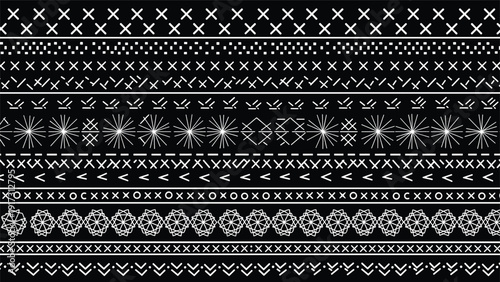 Intricate white geometric borders and ethnic pattern bands displayed horizontally against a solid black background.