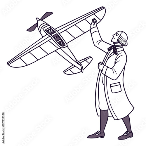 Man in coat holding airplane model