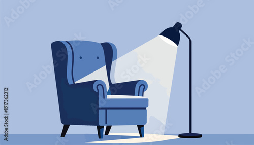 Blue armchair illuminated by a dark floor lamp on a muted background