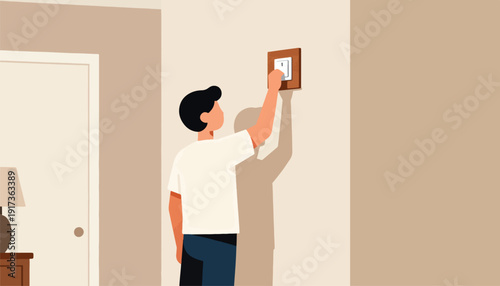 Person's hand reaches to flip a wall light switch