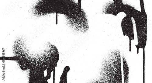 Abstract spray paint drips and splatters on white background.