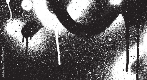 Black and white spray paint texture with drips and splatters.