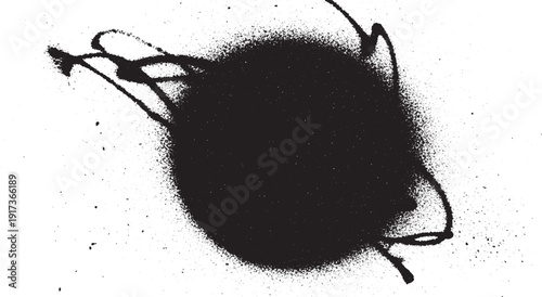 Black spray paint blotch with splatters on white background.