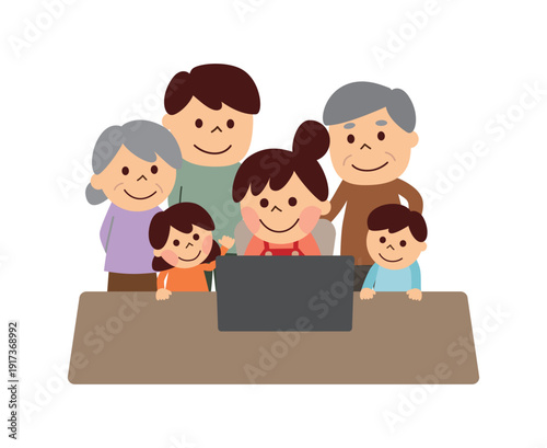 パソコンを見ている三世代家族