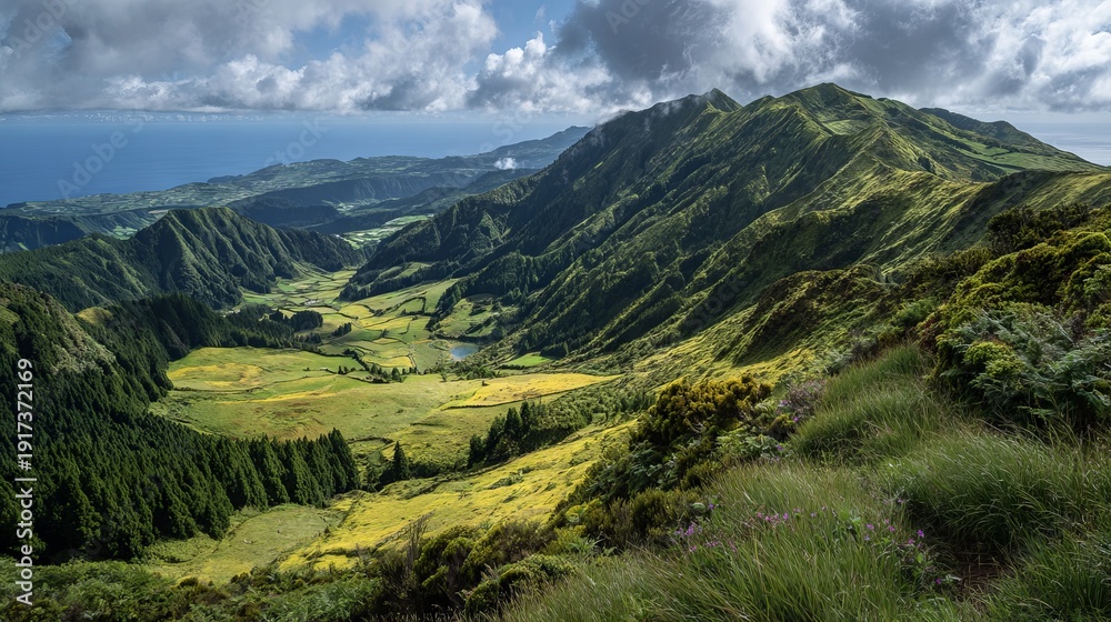 Obraz premium Mountain landscape near Ponta Delgada, Azores, lush green volcanic hills, wide outdoor scenic nature view