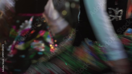 Close Up of Young Mexican Dancers in Colorful Traditional Carnival Dresses at Night