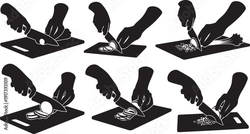 Silhouette of hands cutting food on a chopping board