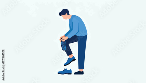 Person bending down, putting on blue dress shoes, one on, one off