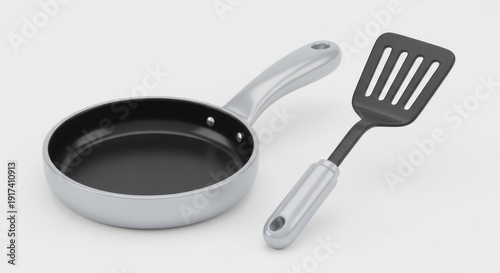 New non-stick frying pan and slotted spatula kitchen tools