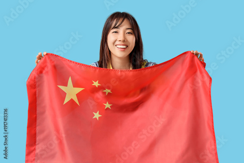 Happy young Asian woman wit...