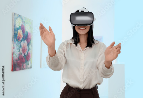 Young woman using VR glasse...