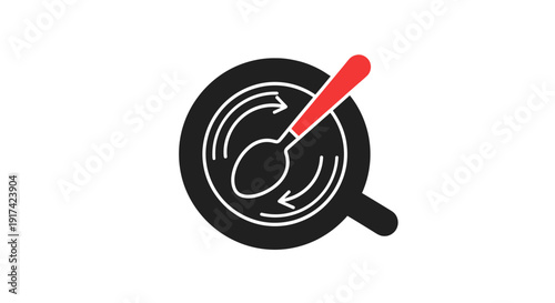 Black frying pan with red spoon.