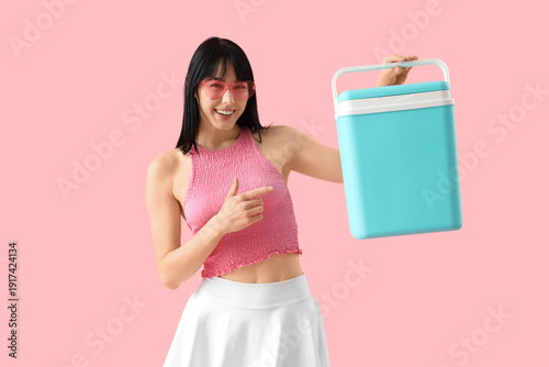 Young woman with portable f...