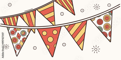 Colorful triangular flags hanging on a string with snowflakes in the background