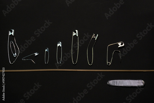Still life creativity using safety pins and paper clips
