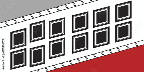 A row of black and white windows on a white building with a red base.