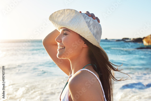 Schilderij op canvas Blue sky, smile and sunset with woman on beach in summer for holiday break, travel or vacation