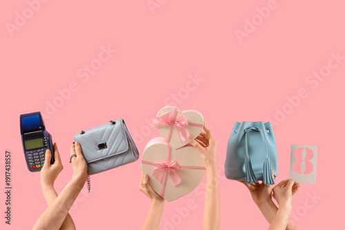 Female hands holding gift b...