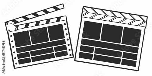 Two black and white film clapperboards standing next to each other