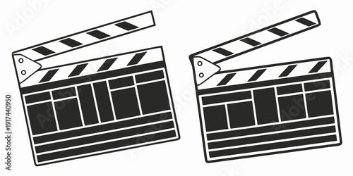 Two black and white clapperboards standing side by side against a white background