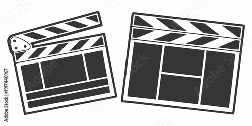 Two black and white film clapperboards standing side by side.