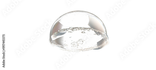 A translucent bubble, reflecting light and shadow on a dark background, isolated