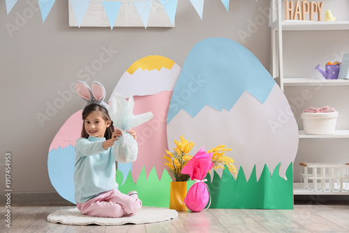 Cute little girl wearing bu...